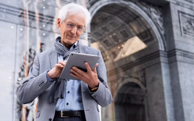stylish-older-man-city-using-tablet stylish-older-man-city-using-tablet
